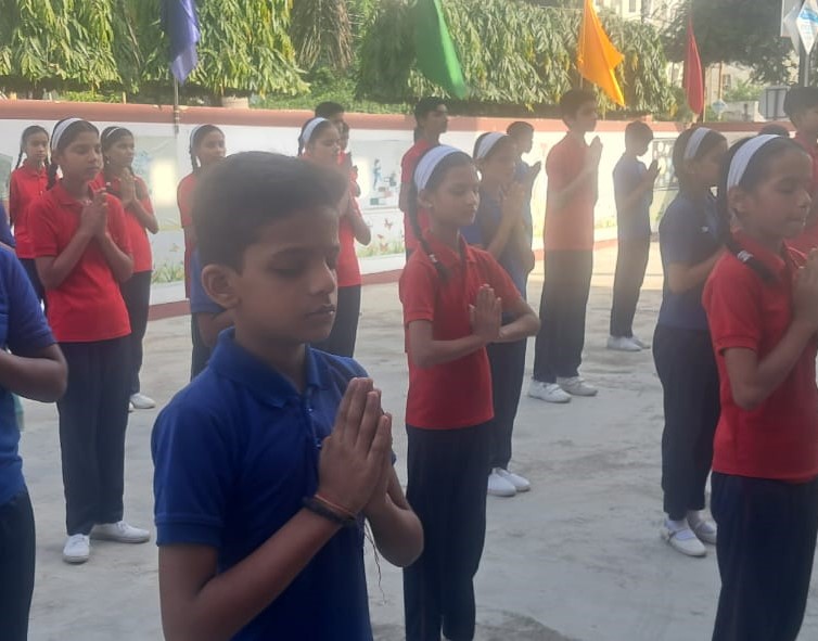 Students offering prayer at SPG Academy
